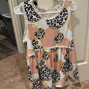 Babydoll top medium. Looks great with black stretch pants.